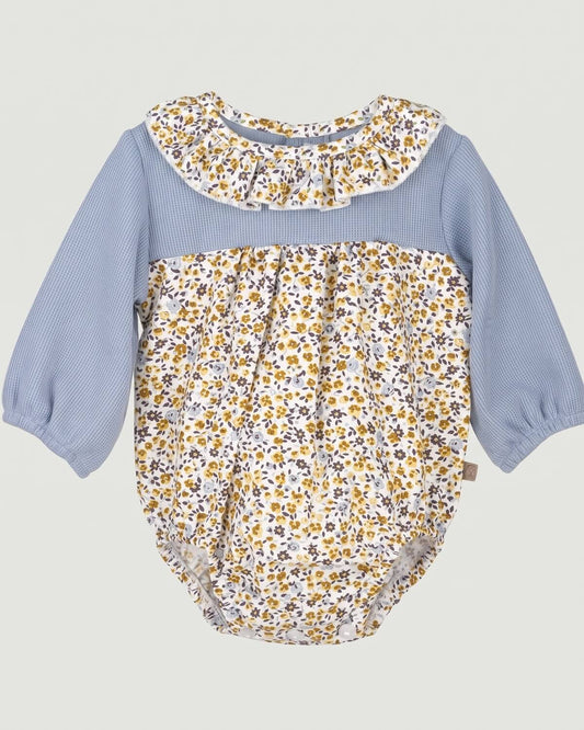 Calamaro traditional Spanish baby romper with steel blue waffle knit bodice, floral print body and frilled collar.
