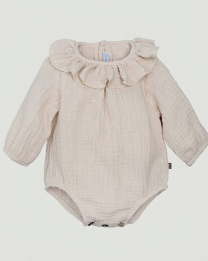 Calamaro traditional Spanish baby romper in cream double gauze plumeti fabric with ruffle collar.