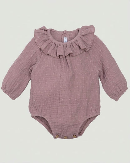 Calamaro  traditional Spanish baby girl romper in dusty pink double gauze plumeti fabric with ruffle collar.