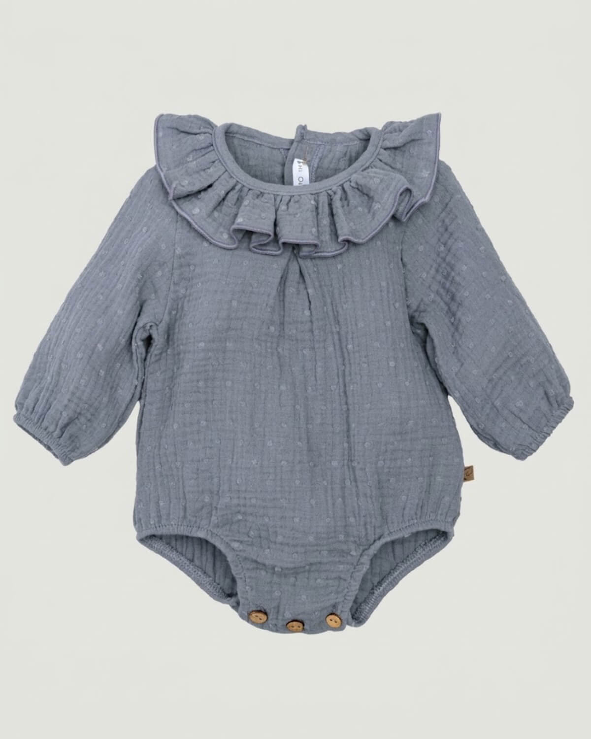 Calamaro traditional Spanish baby romper in slate grey-blue double gauze plumeti fabric with ruffle collar.
