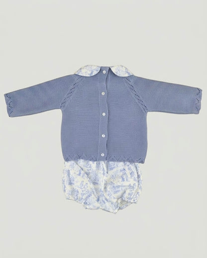 Back view of traditional Spanish baby blue knitted jumper showing button fastening and matching printed bloomers.