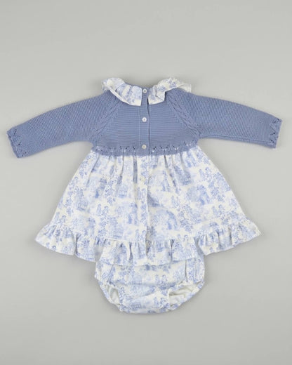 Back view of traditional Spanish baby dress featuring button fastening, toile de Jouy print skirt and matching bloomers.