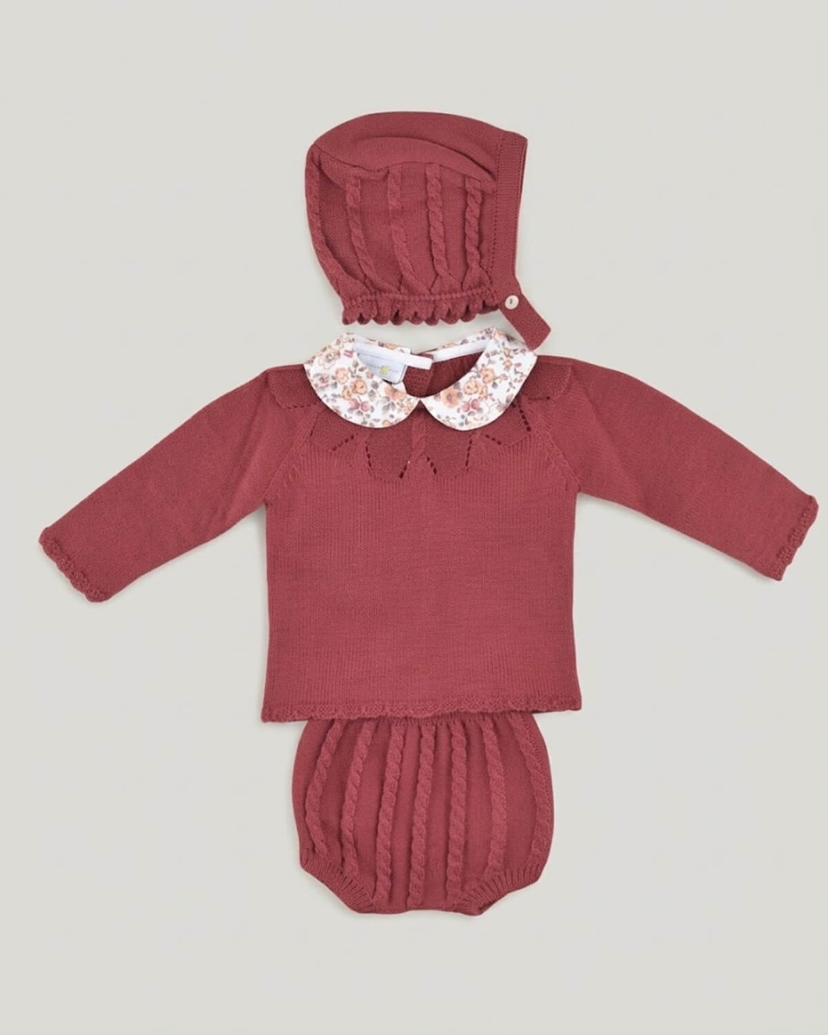 Dulce de Fresa traditional Spanish 3-piece baby set in burgundy knit with floral collar, cable knit bloomers and matching bonnet.